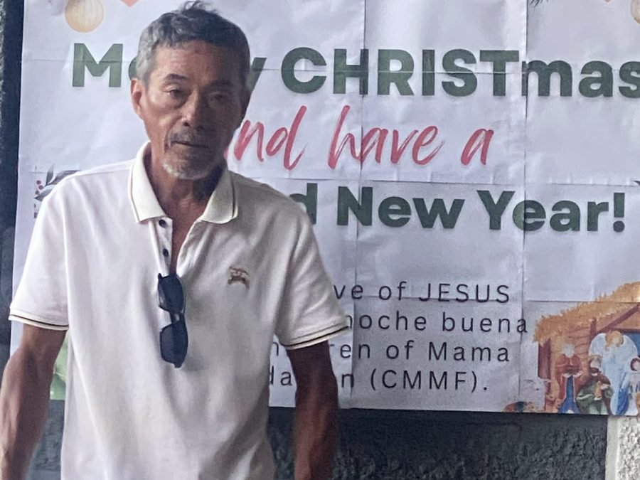 CMMF Noche Buena distribution — a family receiving Christmas aid