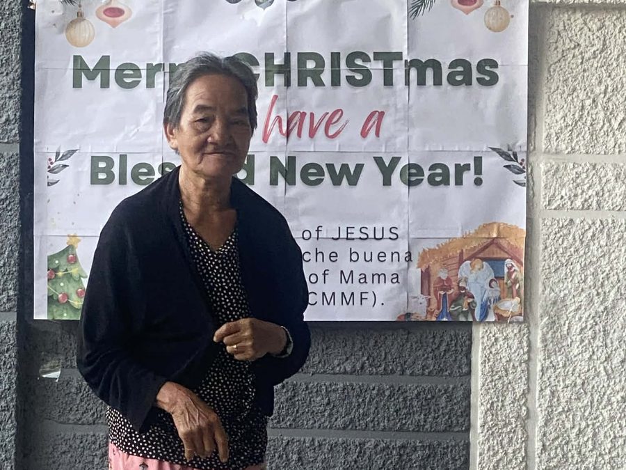 CMMF Noche Buena distribution — a family receiving Christmas aid